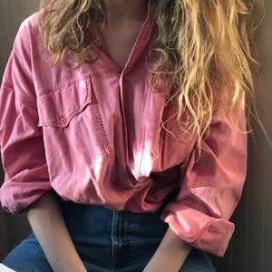 a rustic red button down shirt